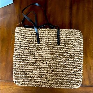 Straw bag with liner. Great for beach/pool outings.